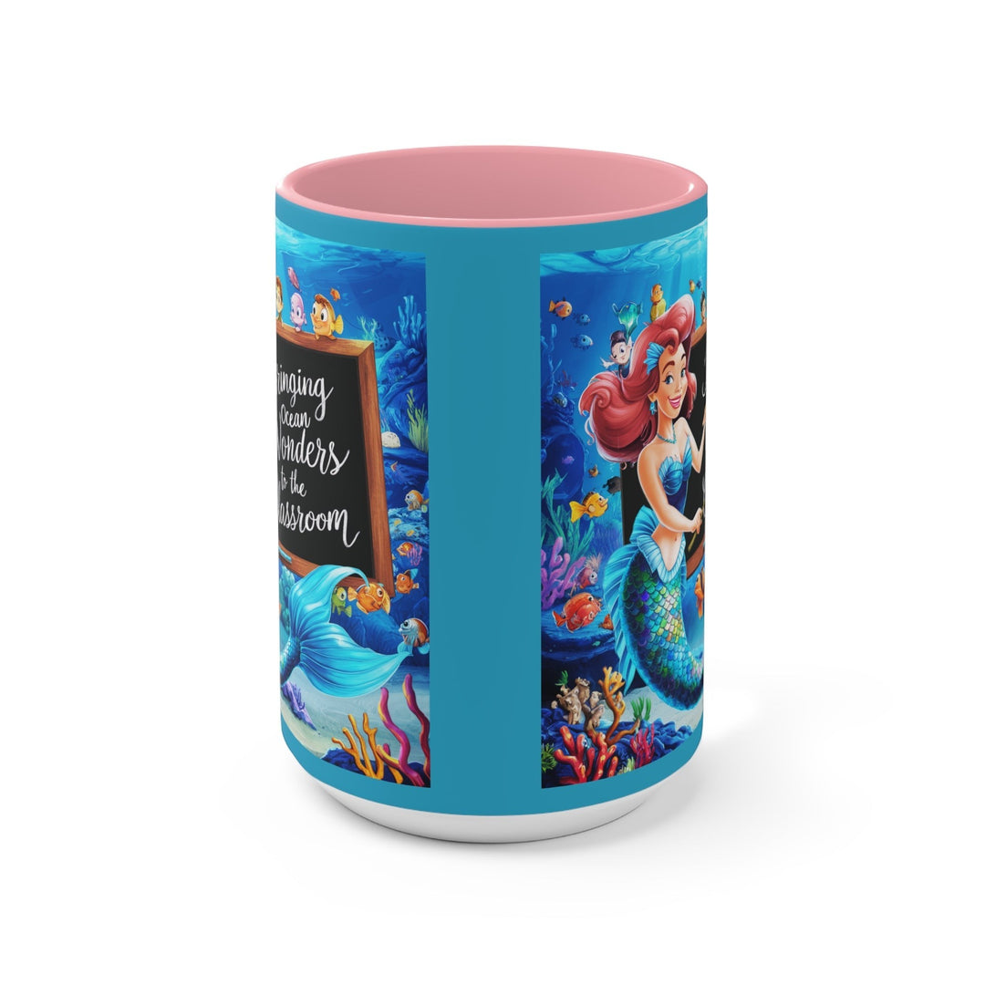 Sea Dragon Dreams ceramic mug with pink interior featuring a mermaid and ocean classroom design.