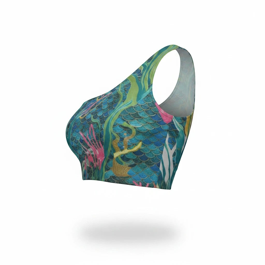 Sea Dragon Dreams one-shoulder cropped top featuring a vibrant blue and green mermaid scale and underwater print.
