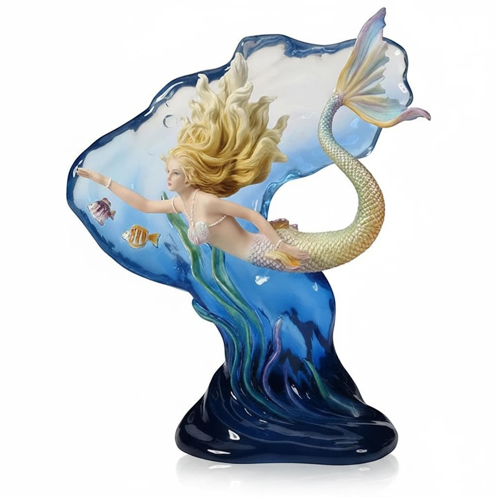 Sea Dragon Dreams polystone mermaid figurine with blond hair, gold-tinged tail, and translucent blue water backdrop.