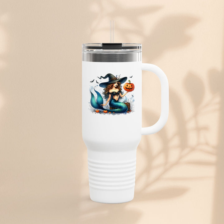 Sea Dragon Dreams 40oz white insulated travel mug featuring a mermaid witch holding a pumpkin for Halloween.