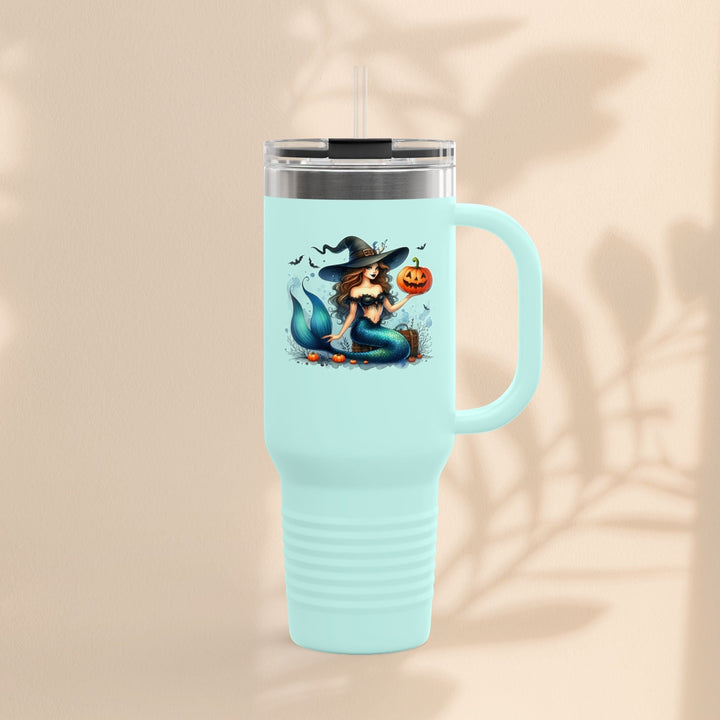 Sea Dragon Dreams 40oz light blue insulated tumbler featuring a mermaid witch holding a pumpkin for Halloween.