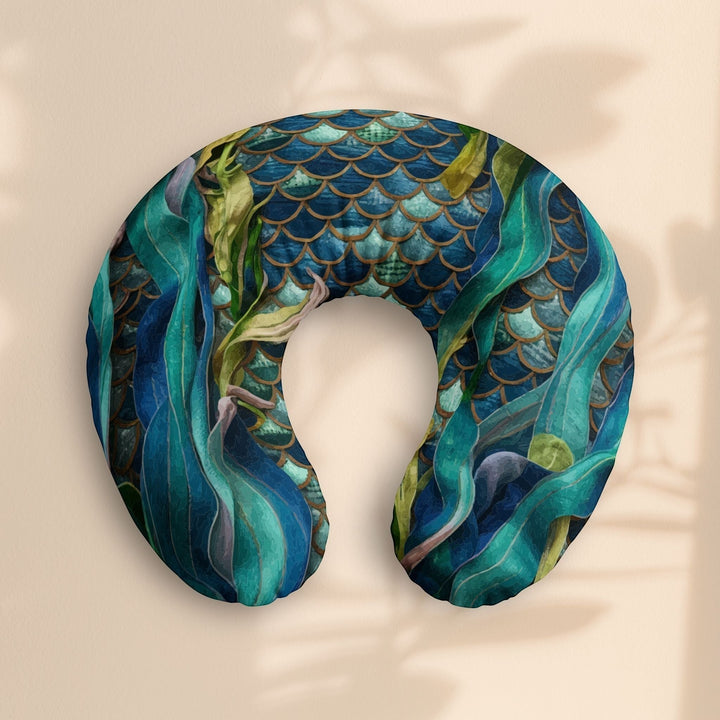 Sea Dragon Dreams nursing pillow cover featuring a teal mermaid scale pattern with flowing aquatic seaweed designs.