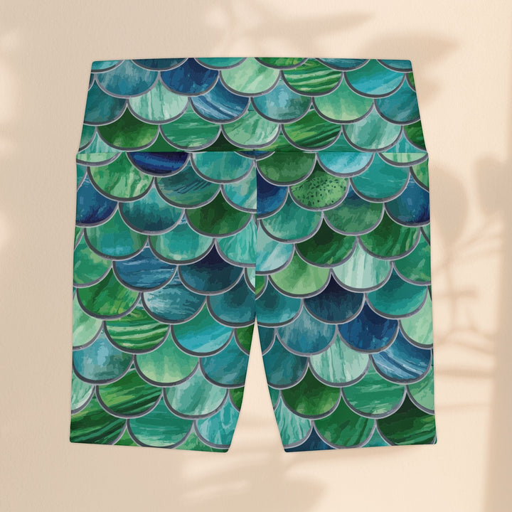 Sea Dragon Dreams mermaid scale workout shorts in vibrant blue and green polyester with a comfortable gusset design.