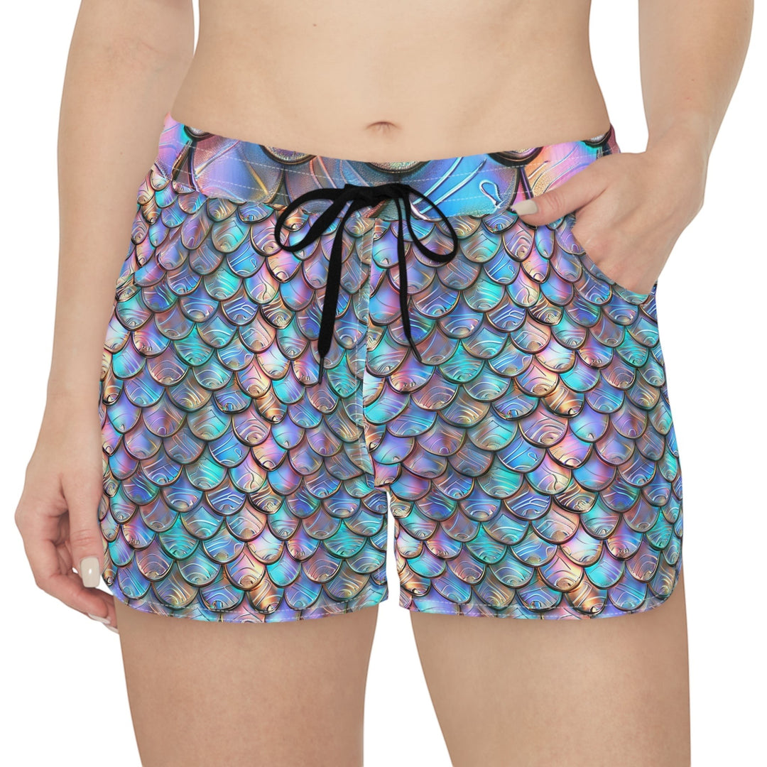 Sea Dragon Dreams women's casual shorts featuring an iridescent rainbow mermaid scale print and black drawstring.