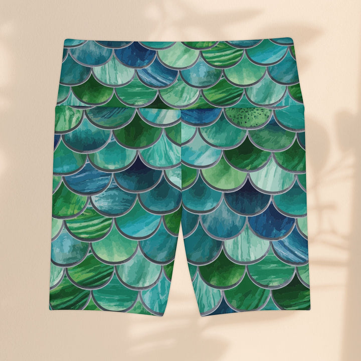 Sea Dragon Dreams mermaid scale workout shorts in vibrant blue and green polyester with a comfortable gusset design.