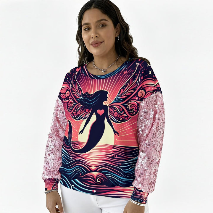 Sea Dragon Dreams sweatshirt with mermaid graphic, pink sequin sleeves, and a relaxed fit on a female model.