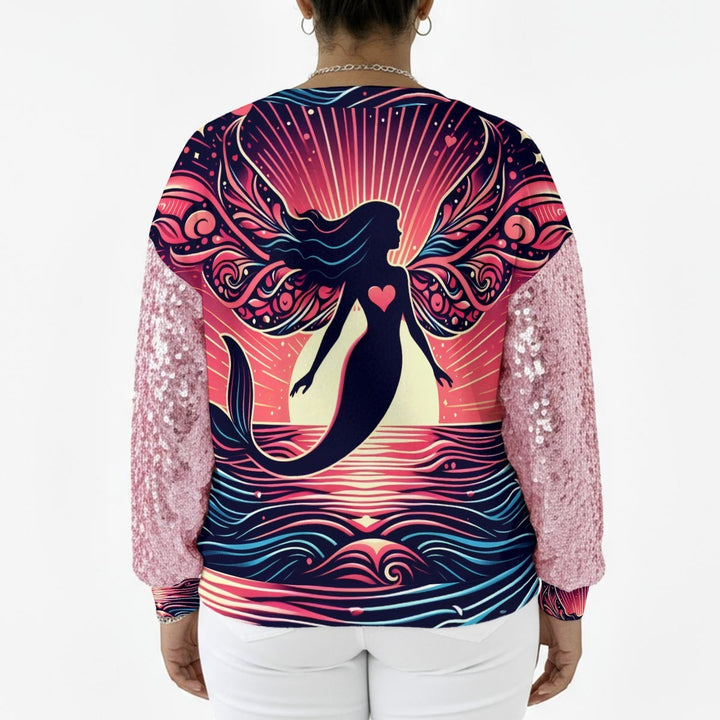 Sea Dragon Dreams sweatshirt with pink sequin sleeves and a back graphic of a mermaid silhouette at sunset.