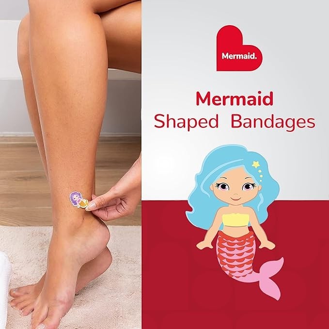 Sea Dragon Dreams mermaid-shaped adhesive bandages applied to a person's ankle, featuring a cute cartoon mermaid.