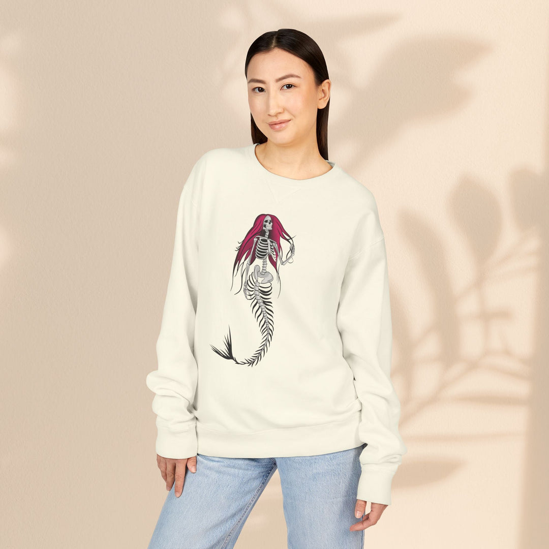 Sea Dragon Dreams crewneck sweatshirt in off-white featuring a gothic mermaid skeleton graphic with pink hair.
