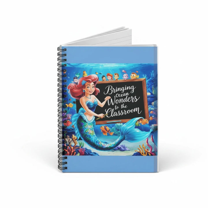 Sea Dragon Dreams spiral notebook featuring a whimsical mermaid teacher illustration on a blue underwater classroom background