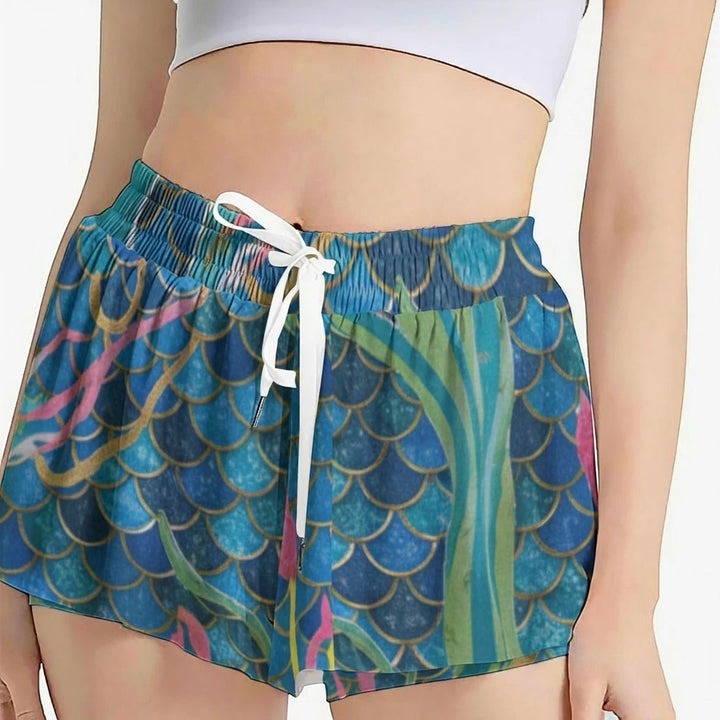 Sea Dragon Dreams women's sport skorts featuring a blue mermaid scale pattern, elastic waistband, and white drawstring.