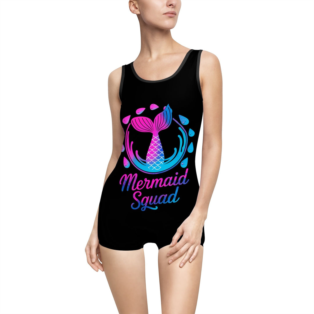 Sea Dragon Dreams vintage-style black one-piece swimsuit with a pink and blue Mermaid Squad graphic print