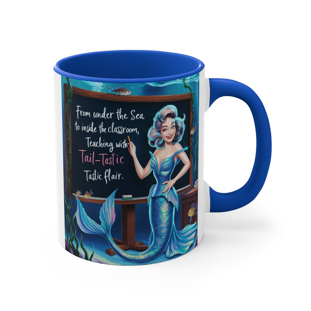 Sea Dragon Dreams 11oz ceramic accent mug with a blue handle and interior featuring a mermaid teacher illustration.