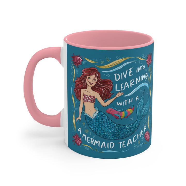 Sea Dragon Dreams ceramic mug with pink interior and handle featuring a mermaid teacher Dive Into Learning illustration