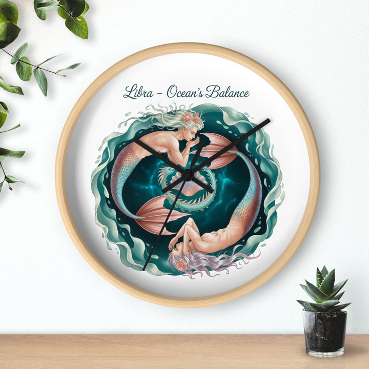 Sea Dragon Dreams Libra Ocean's Balance wooden wall clock with a mermaid illustration and teal wave design.