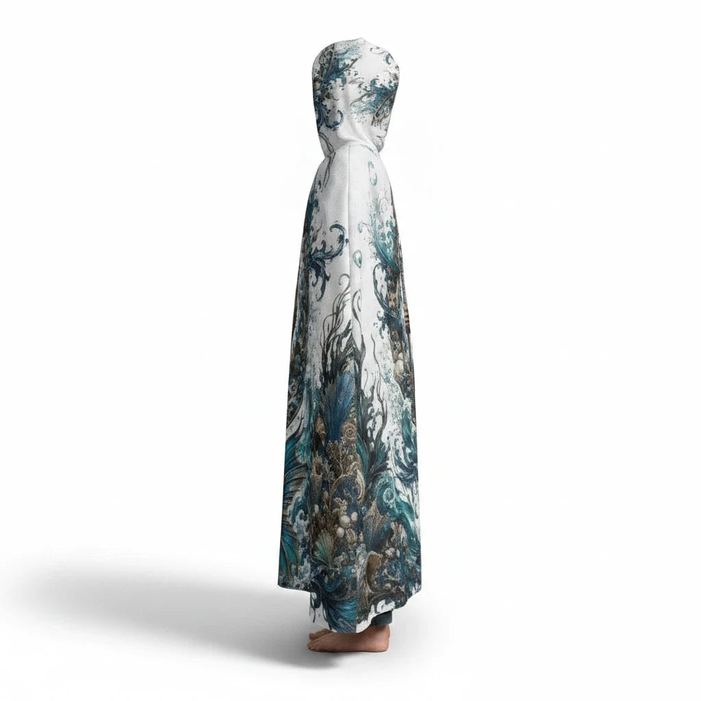 Sea Dragon Dreams unisex hooded cloak in white scuba fabric with detailed blue and brown ocean-themed merman artwork.