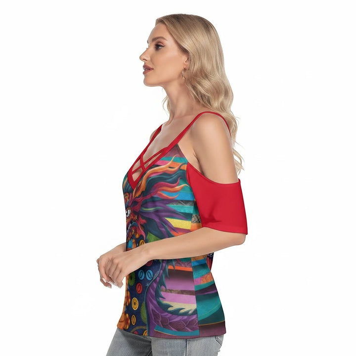 Sea Dragon Dreams cold shoulder t-shirt with a colorful Mexican dragon print, red straps, and criss-cross chest detail.