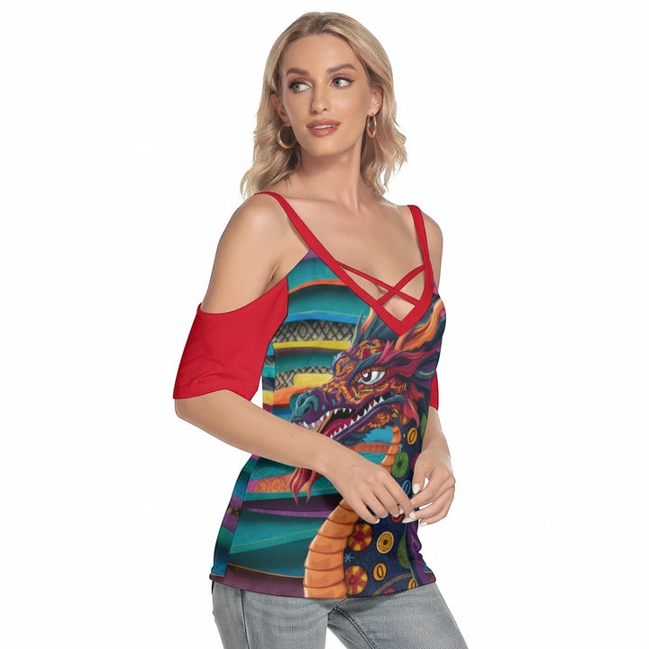 Sea Dragon Dreams women's cold shoulder t-shirt with a colorful Mexican dragon print and red criss-cross chest straps.