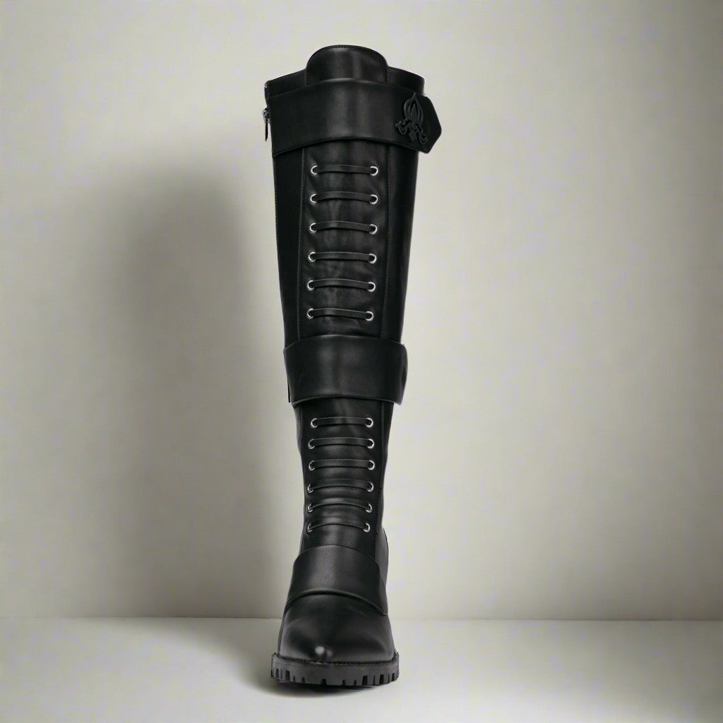 Sea Dragon Dreams Michaela V Aspen Marta black knee-high leather boots with lace-up front and buckled strap detail.