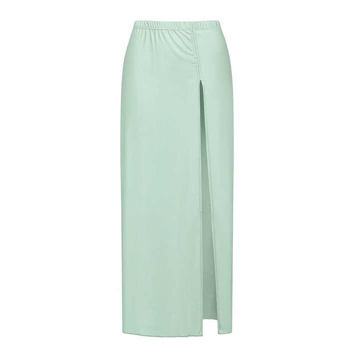 Sea Dragon Dreams mint green maxi skirt with a high front slit, made from soft, stretchy fabric for resort wear.