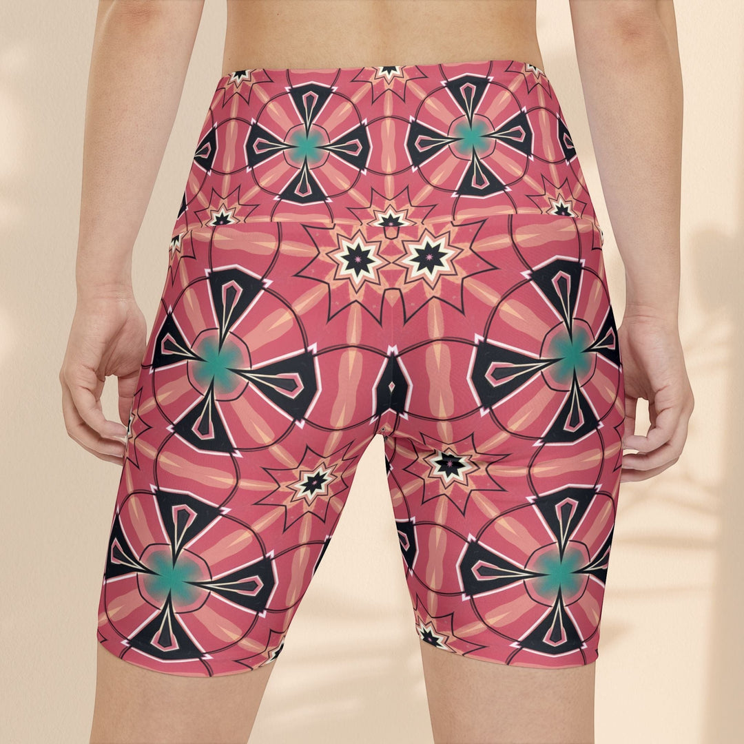 Sea Dragon Dreams Mystic Circles workout shorts in pink with a floral and geometric pattern, featuring a stretchy fit.