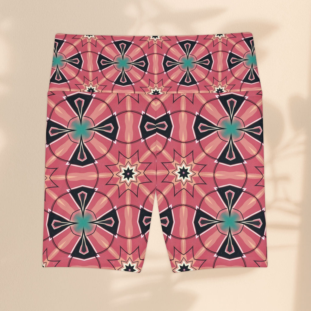 Sea Dragon Dreams Mystic Circles workout shorts in pink with a vibrant floral and geometric pattern.