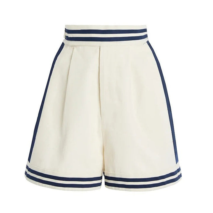 Sea Dragon Dreams high-waisted cream shorts with navy blue striped trim and a nautical-inspired design