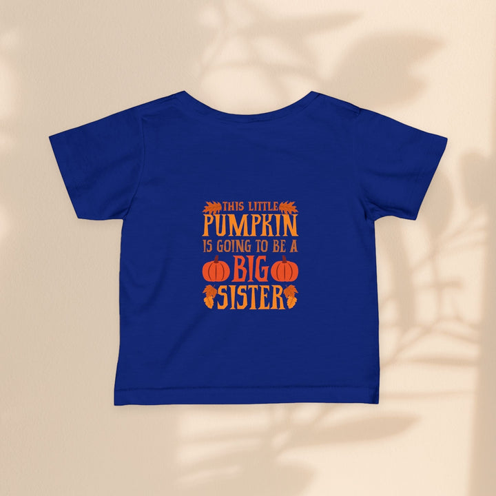 Sea Dragon Dreams infant fine jersey t-shirt in navy blue with orange Big Sister Pumpkin graphic print.