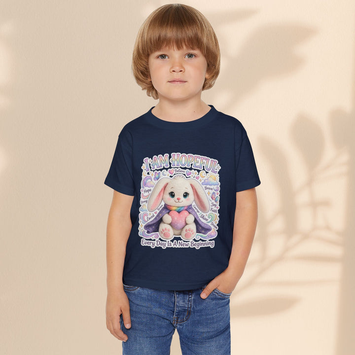 Sea Dragon Dreams toddler t-shirt in navy blue cotton featuring a cute bunny graphic and I Am Hopeful text.