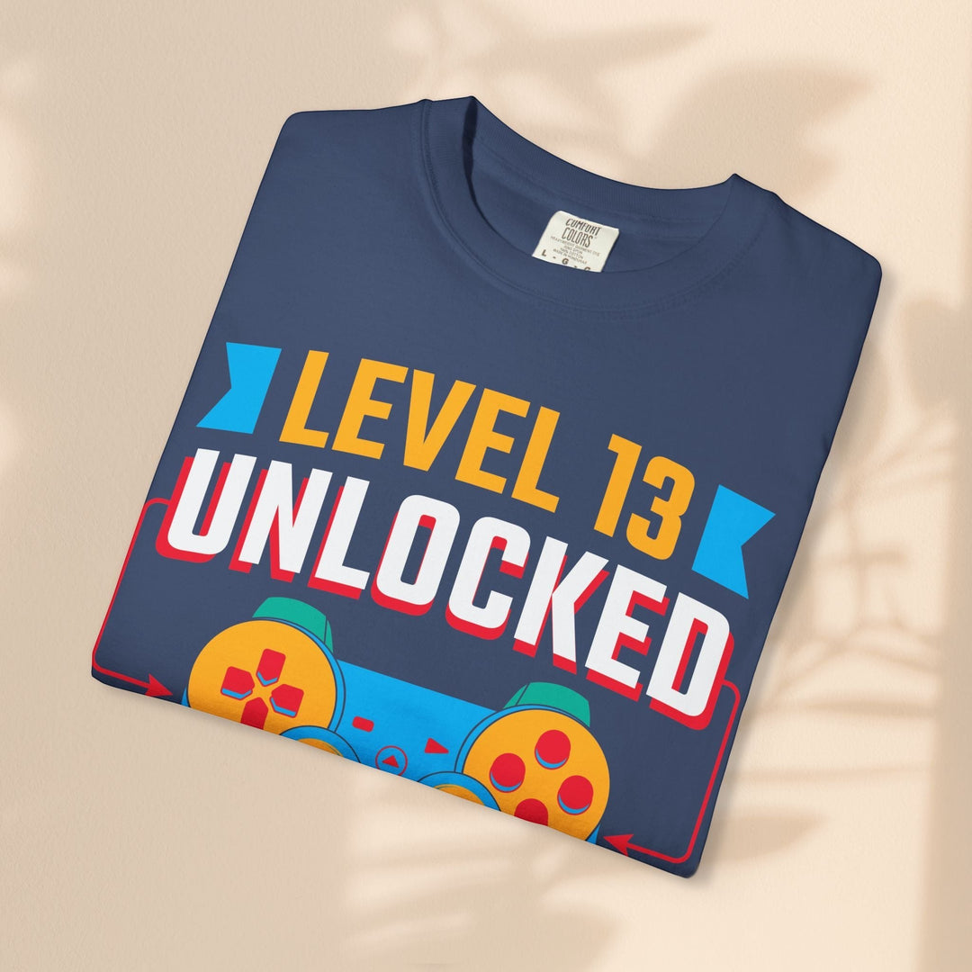 Sea Dragon Dreams navy blue cotton gamer t-shirt featuring a Level 13 Unlocked graphic with a retro game controller.