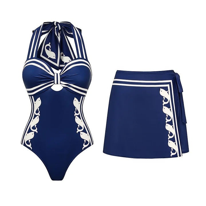 Sea Dragon Dreams navy blue halter one-piece swimsuit with white nautical fish print and matching wrap skirt