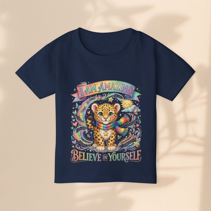 Sea Dragon Dreams navy cotton toddler t-shirt featuring a cute leopard with a rainbow scarf and uplifting text.