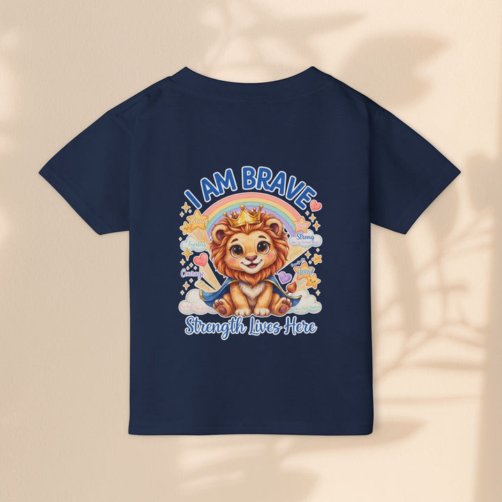 Sea Dragon Dreams navy blue cotton toddler t-shirt with a Leo Lion graphic, crown, rainbow, and I Am Brave text.