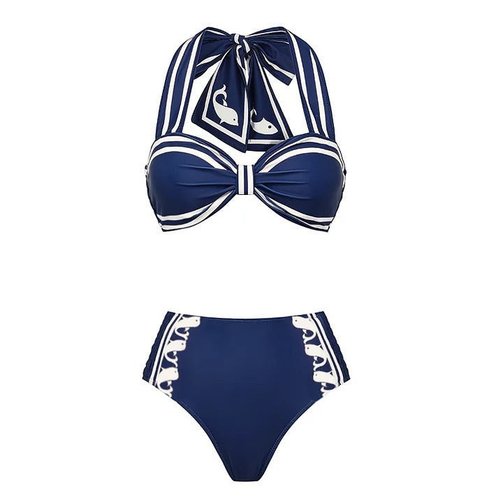 Sea Dragon Dreams navy blue high-waisted bikini with halter top, white stripe accents, and cute whale print details.