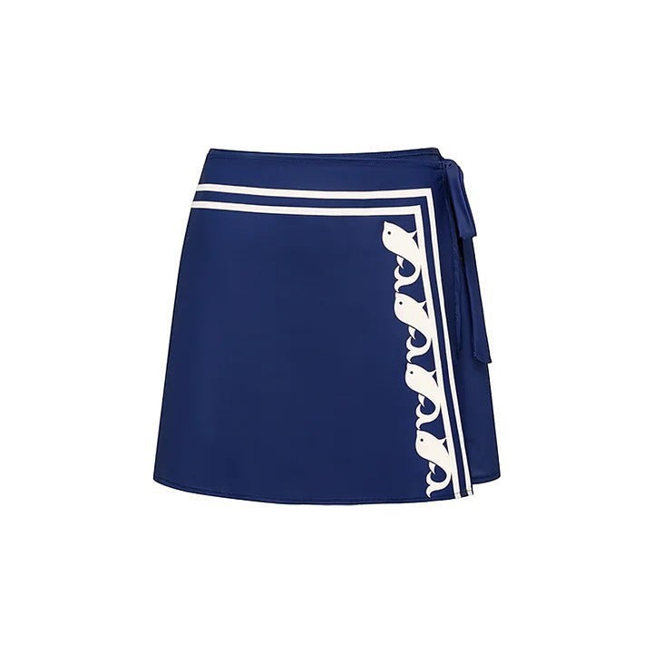 Sea Dragon Dreams navy blue wrap swim skirt with white border and bird pattern detail