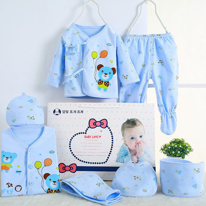Sea Dragon Dreams newborn baby gift set in light blue cotton with cute bear and balloon prints, including clothing.