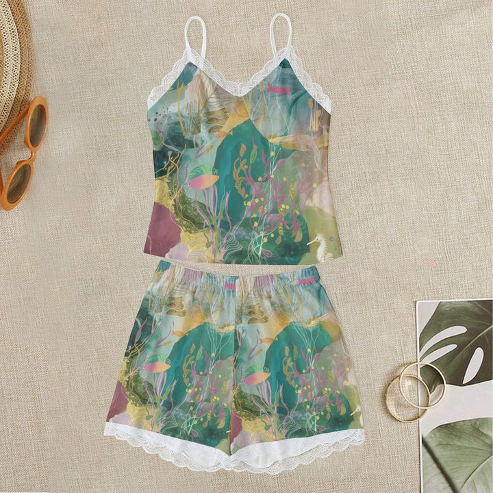 Sea Dragon Dreams women's cami pajama set with ocean-inspired print, white lace trim, and adjustable straps.