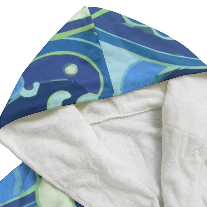 Sea Dragon Dreams unisex flannel hooded bathrobe with a blue and green ocean wave pattern and soft white plush lining