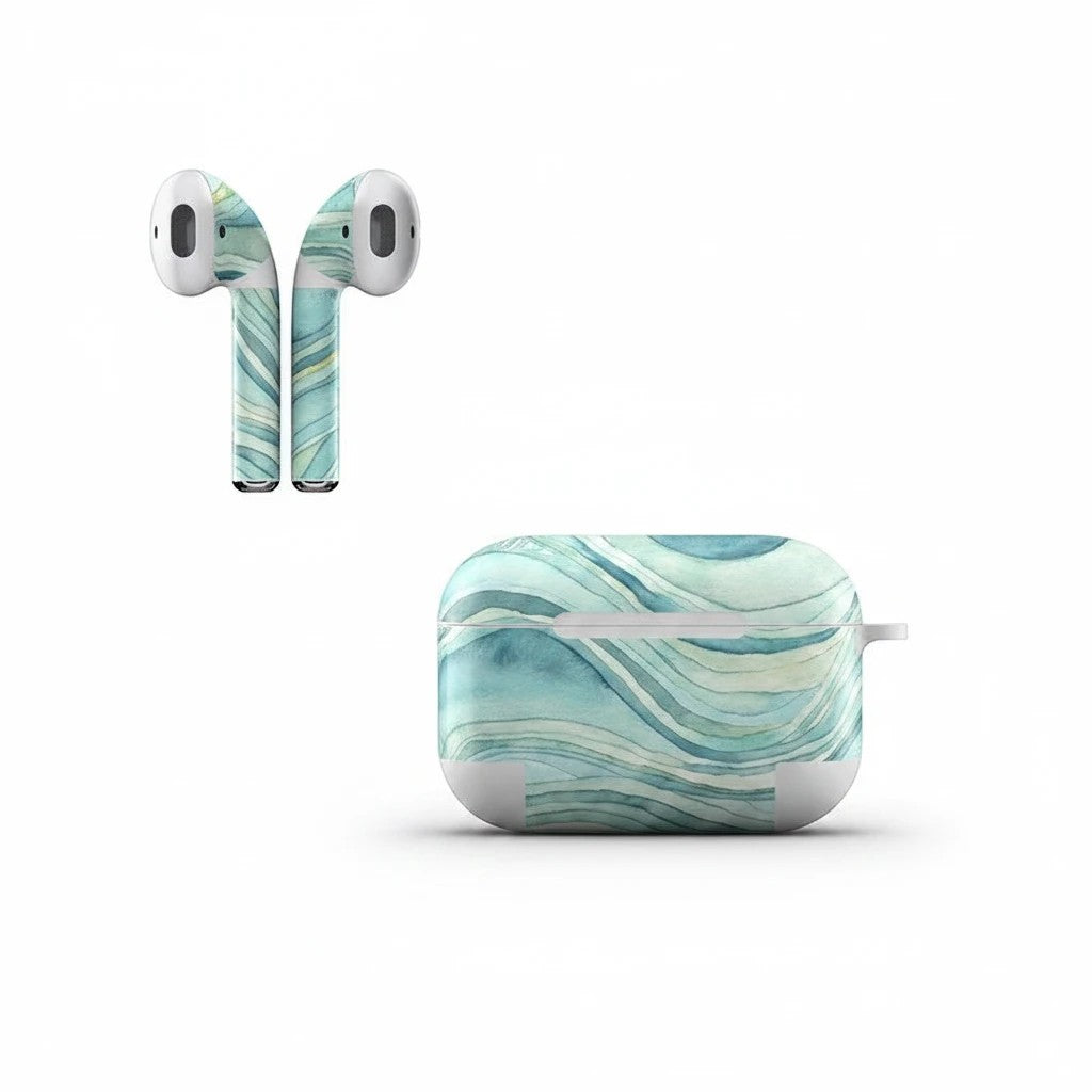 Sea Dragon Dreams ocean waves vinyl skin applied to an Apple AirPods charging case and matching earbuds