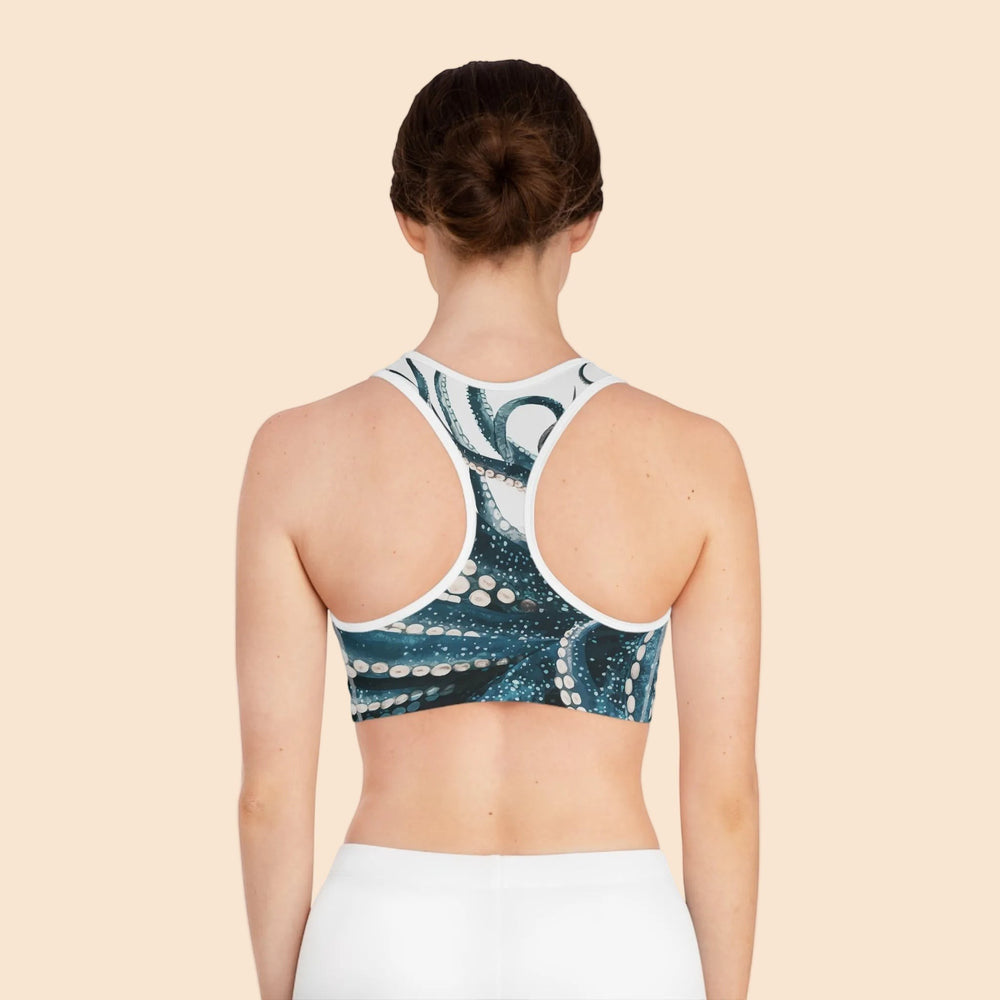 Sea Dragon Dreams octopus print sports bra with racerback design, moisture-wicking fabric, and white trim, back view.