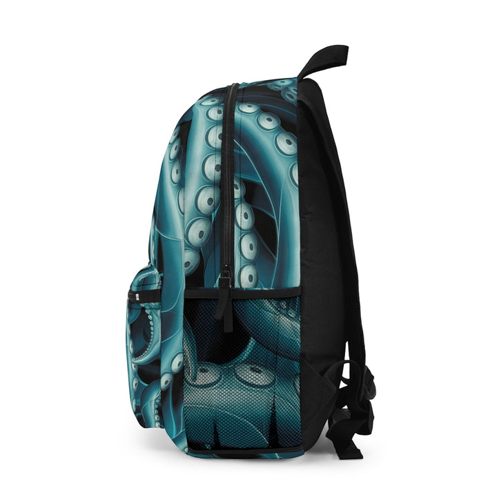 Sea Dragon Dreams Octopus Twist Backpack in blue with a detailed tentacle pattern, side view showing mesh pocket.