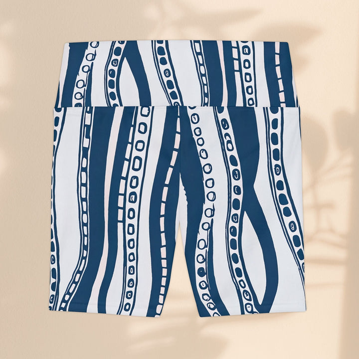 Sea Dragon Dreams workout shorts featuring a navy blue and white octopus tentacle print on 100% polyester fabric.