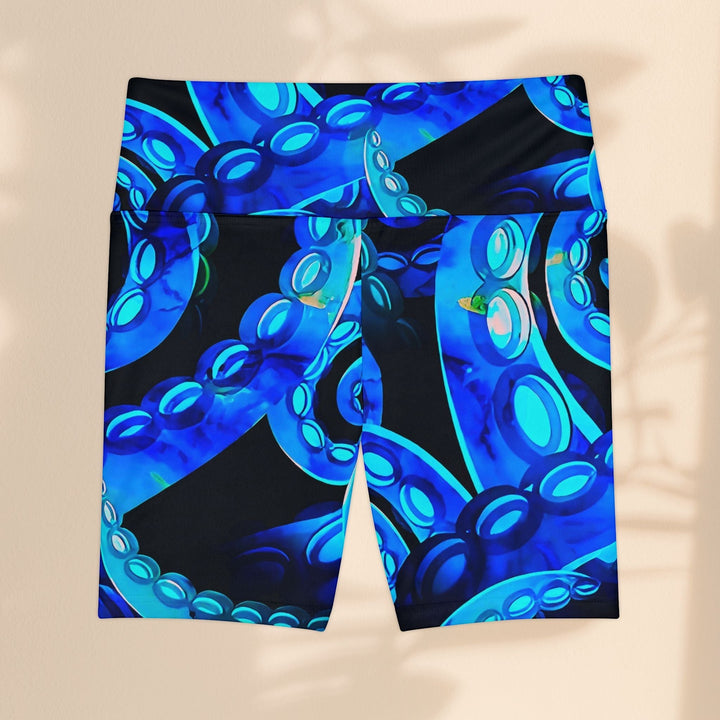 Sea Dragon Dreams Octopus Delight workout shorts featuring a vibrant blue octopus tentacle print on black polyester.