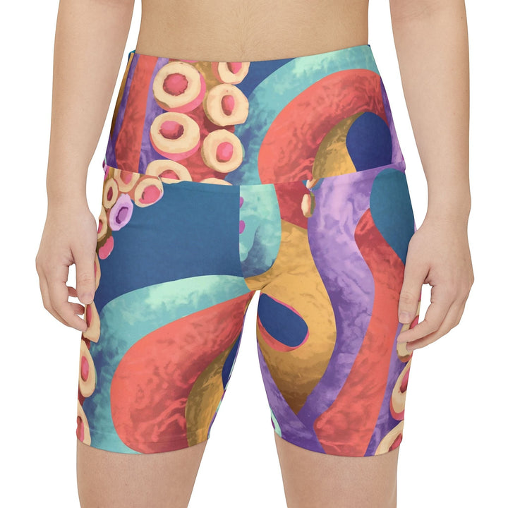 Sea Dragon Dreams high-waisted workout shorts featuring a vibrant, colorful octopus tentacle pattern on polyester fabric.