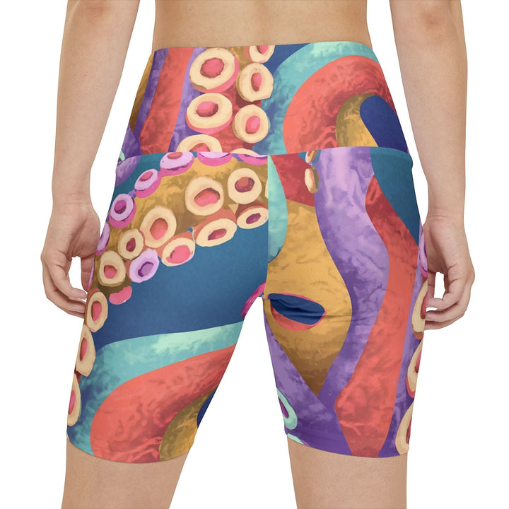 Sea Dragon Dreams women's high-waisted workout shorts featuring a vibrant, colorful octopus tentacle print.