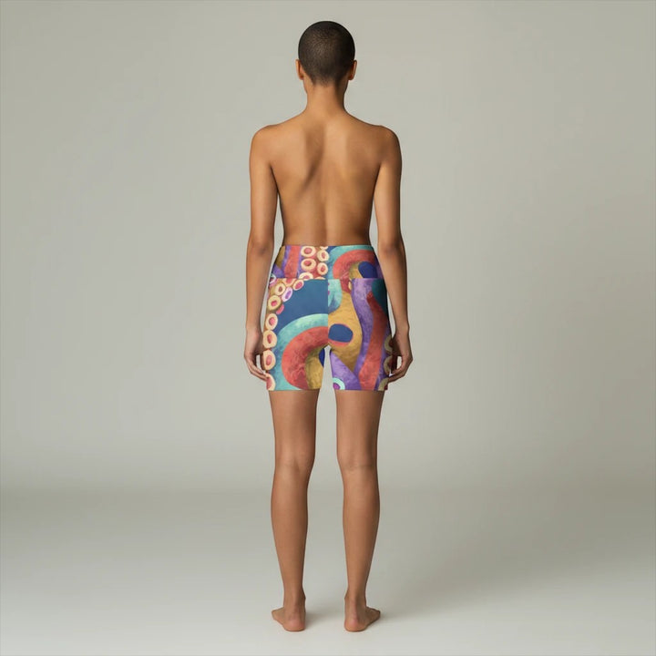 Sea Dragon Dreams women's workout shorts with vibrant octopus tentacle print and high waistband, back view.