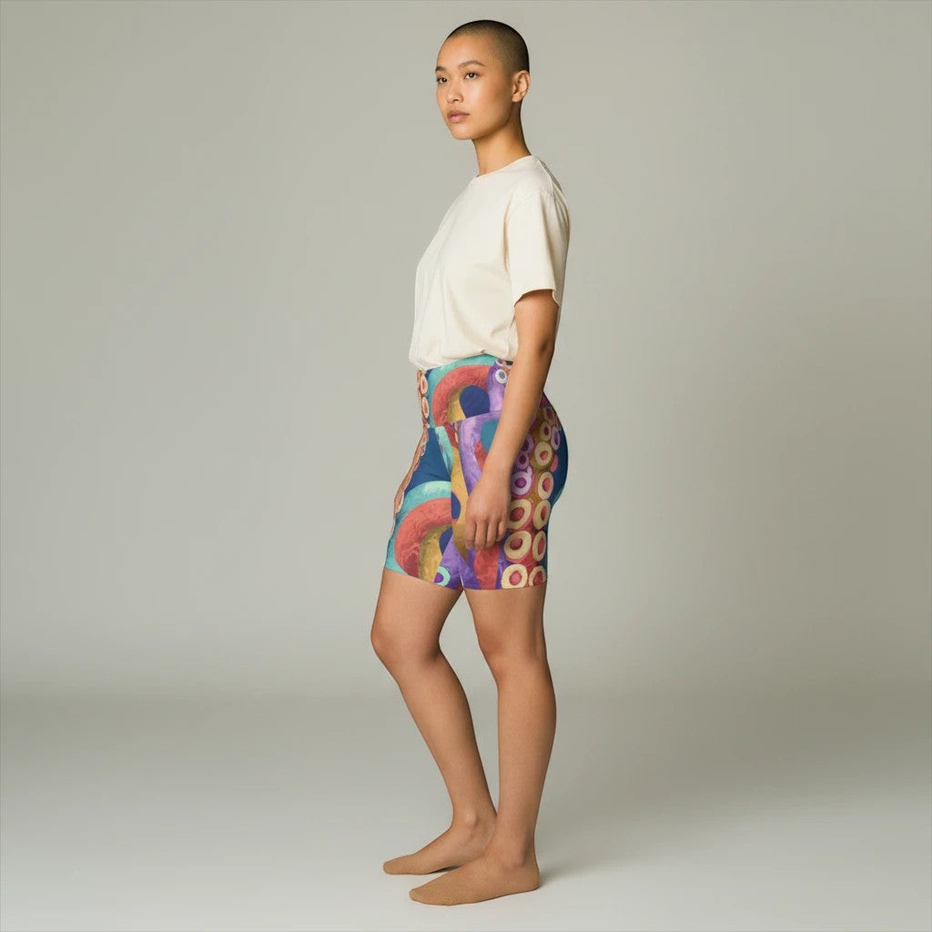 Sea Dragon Dreams women's high-waisted workout shorts featuring a vibrant octopus pattern on moisture-wicking fabric.