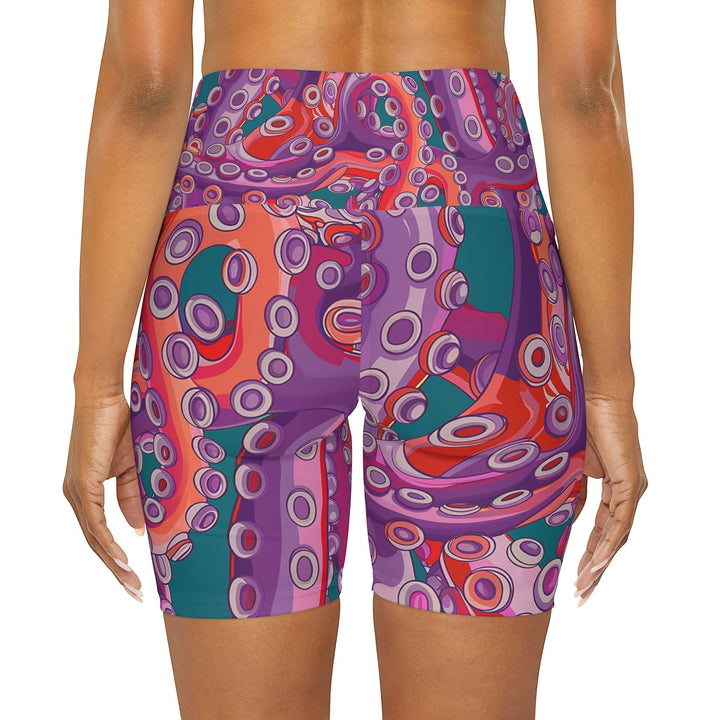 Sea Dragon Dreams high waisted yoga shorts featuring a vibrant purple and red octopus tentacle pattern on microfiber