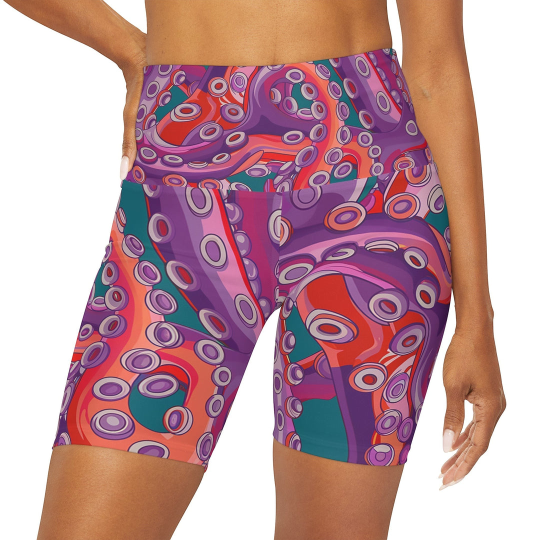 Sea Dragon Dreams high waisted yoga shorts featuring a vibrant purple and orange octopus tentacle pattern.