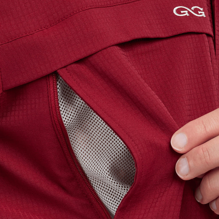 Sea Dragon Dreams oxblood long sleeve scout shirt featuring a zippered chest pocket with mesh ventilation lining.